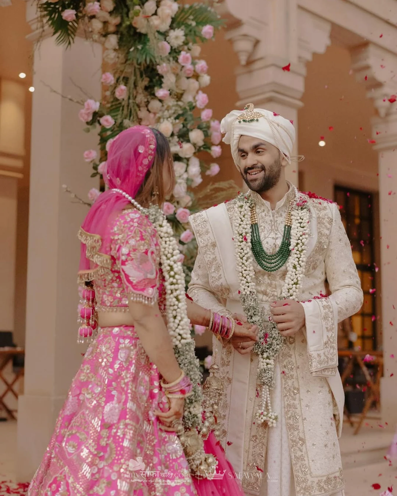 wedding safa wala in City Centre – Close detail of a red wedding safa with an emerald kalgi